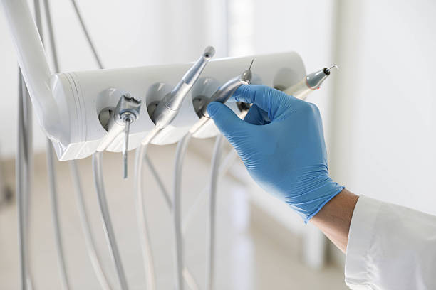 Professional Invisalign Clear Aligners technician working in Ogden, IA